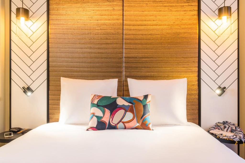 Cama ou camas em um quarto em Mercure Luxembourg Off Kirchberg