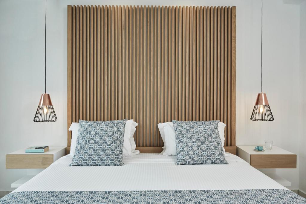 Postel nebo postele na pokoji v ubytování Grand Beach Hotel