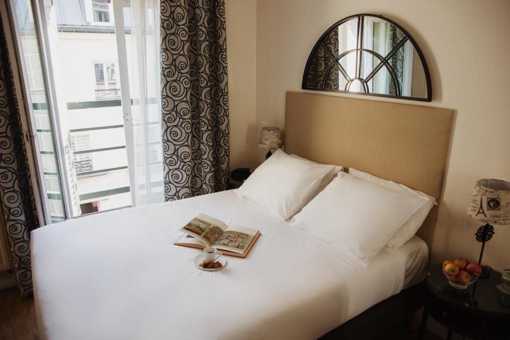 En eller flere senge i et værelse på Arcadie Montparnasse