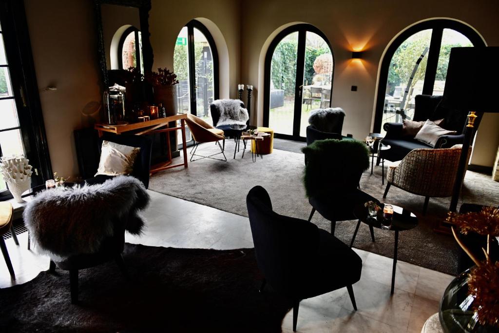 Posezení v ubytování Hotel Ten Lande