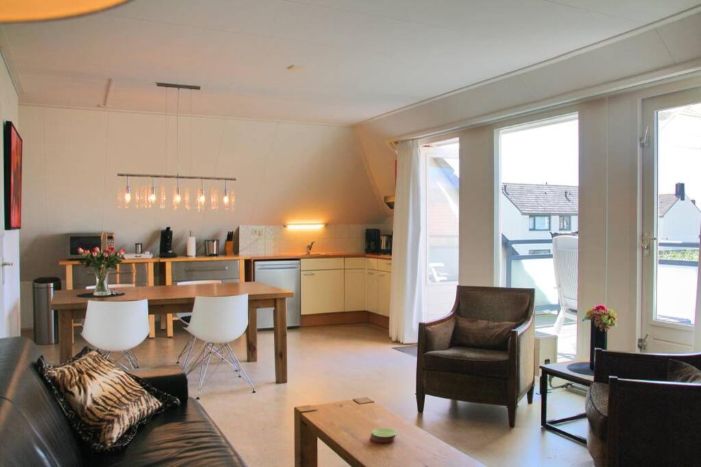 Posezení v ubytování Appartement Abbestederweg Callantsoog