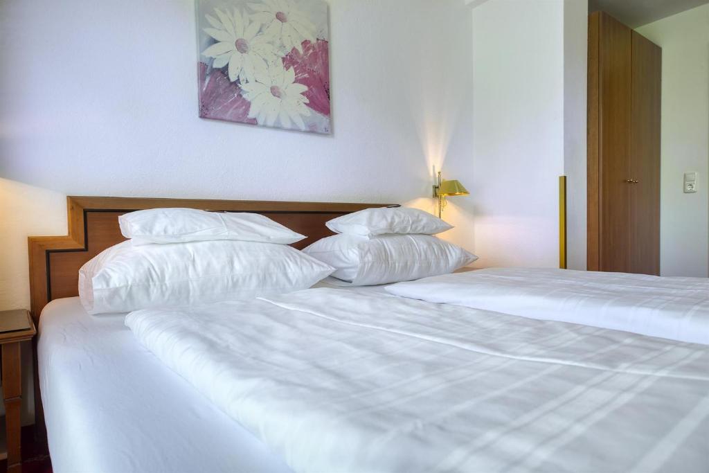 Posteľ alebo postele v izbe v ubytovaní Hotel Friesacherhof