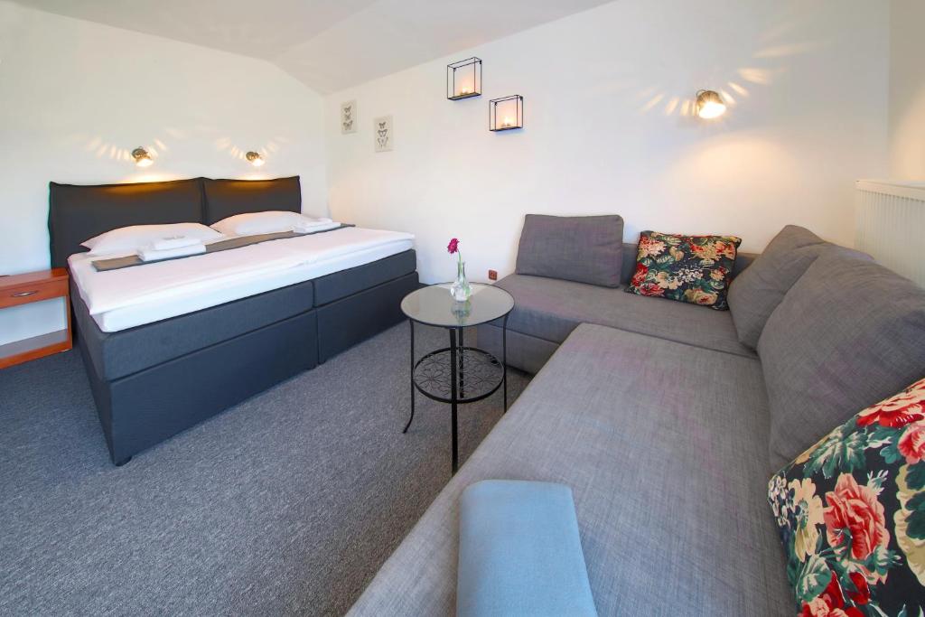Postel nebo postele na pokoji v ubytování Hotel BRADA