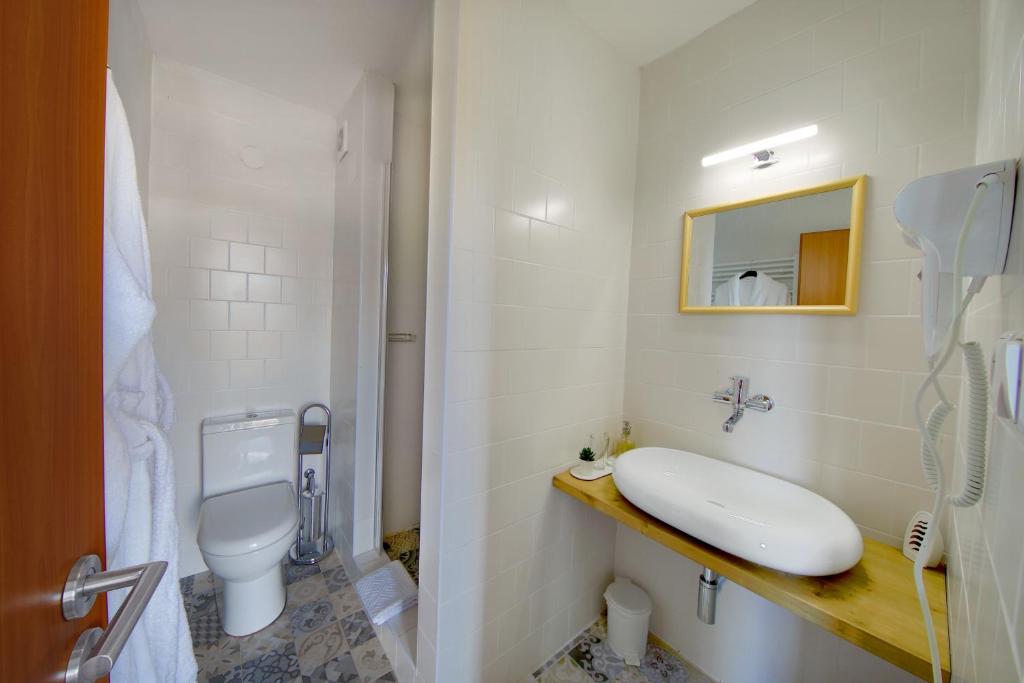 Koupelna v ubytování Hotel BRADA