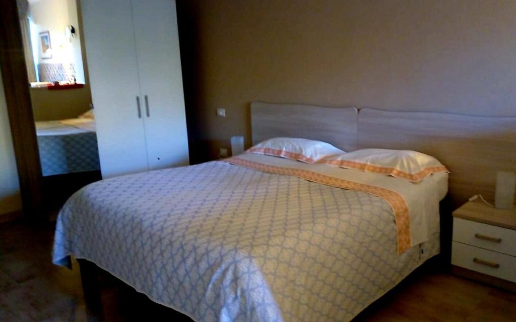 Postel nebo postele na pokoji v ubytování B&B GIRAMONDO