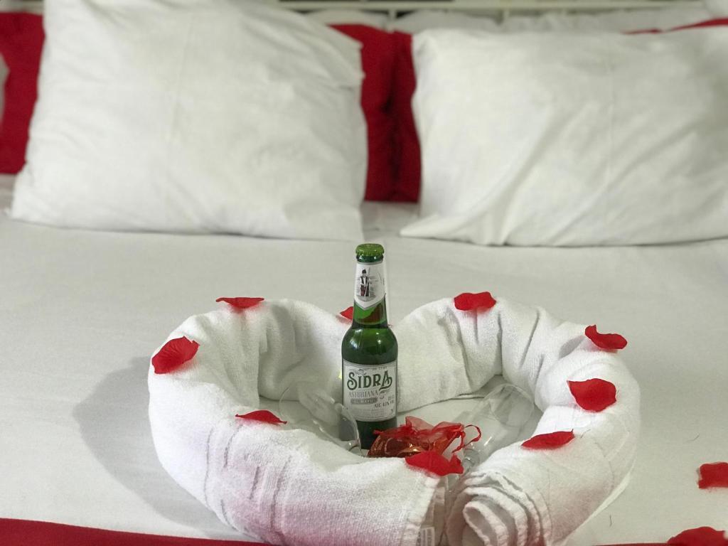 Postel nebo postele na pokoji v ubytování Hotel Argos