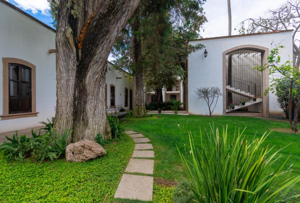 Zahrada ubytování Hotel Hacienda San Cristóbal