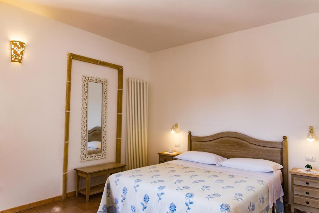 Postel nebo postele na pokoji v ubytování Villa Narducci