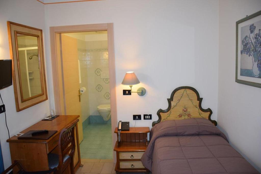 TV a/nebo společenská místnost v ubytování Park Hotel Mater Dei