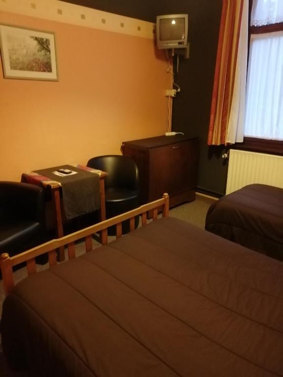 Postel nebo postele na pokoji v ubytování Le Liège