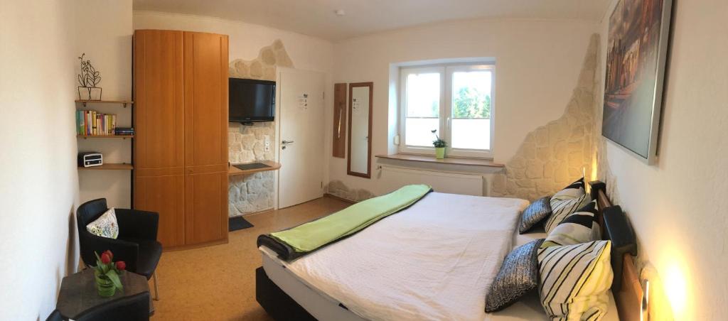 Postel nebo postele na pokoji v ubytování Appartement Pension Schüßler