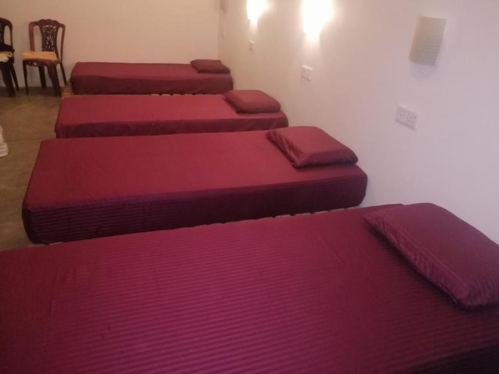 Postel nebo postele na pokoji v ubytování Tiki bar hostel ella