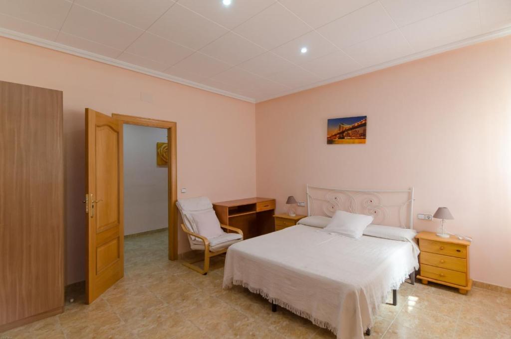 Postel nebo postele na pokoji v ubytování Club Villamar - Germana