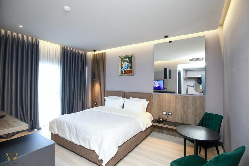 Postel nebo postele na pokoji v ubytování Hotel Olive