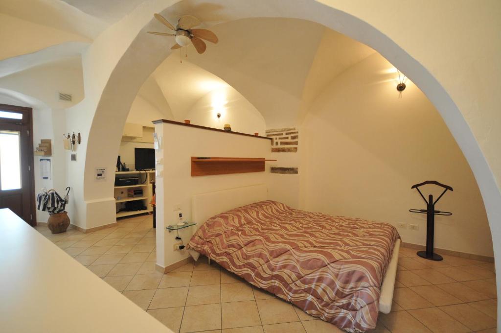 سرير أو أسرّة في غرفة في Cà di Nevi