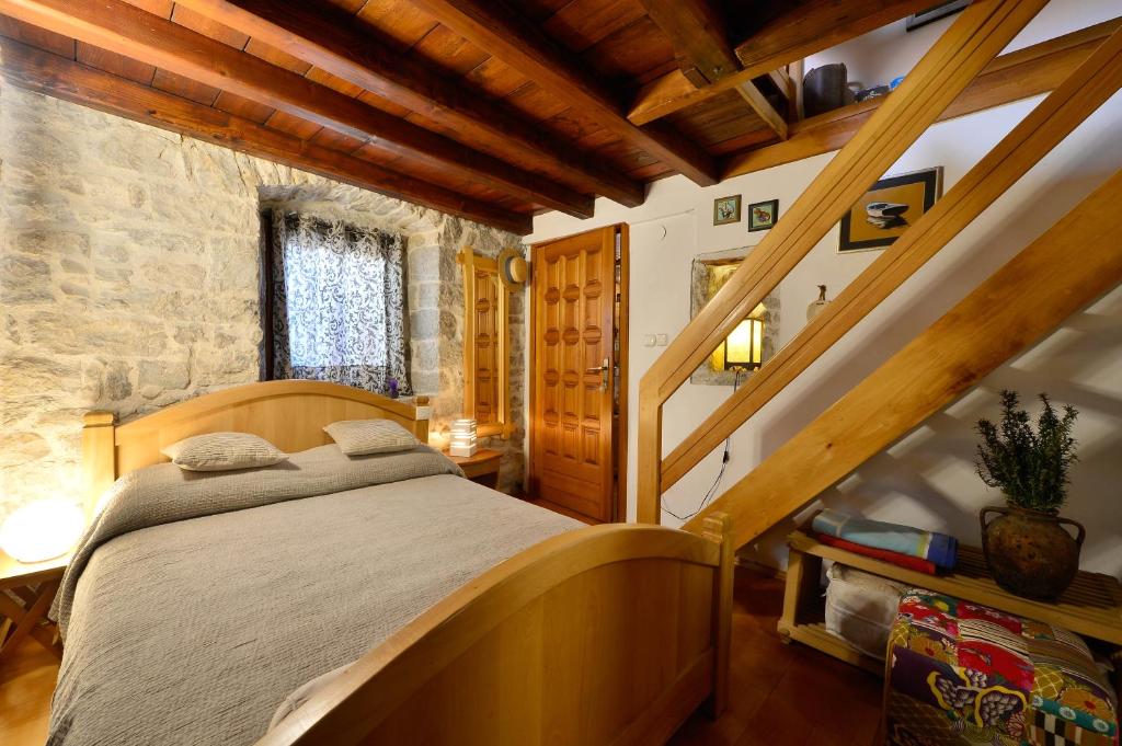 Postel nebo postele na pokoji v ubytování Apartments Salvezani