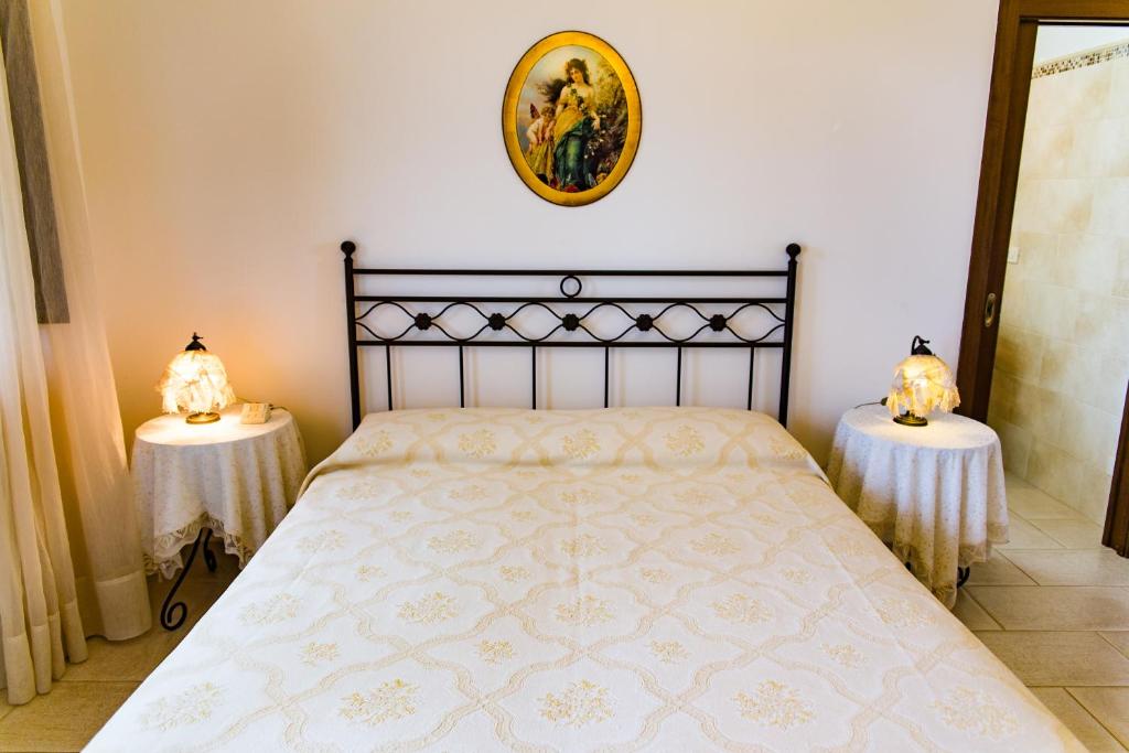 Postel nebo postele na pokoji v ubytování Villa Narducci