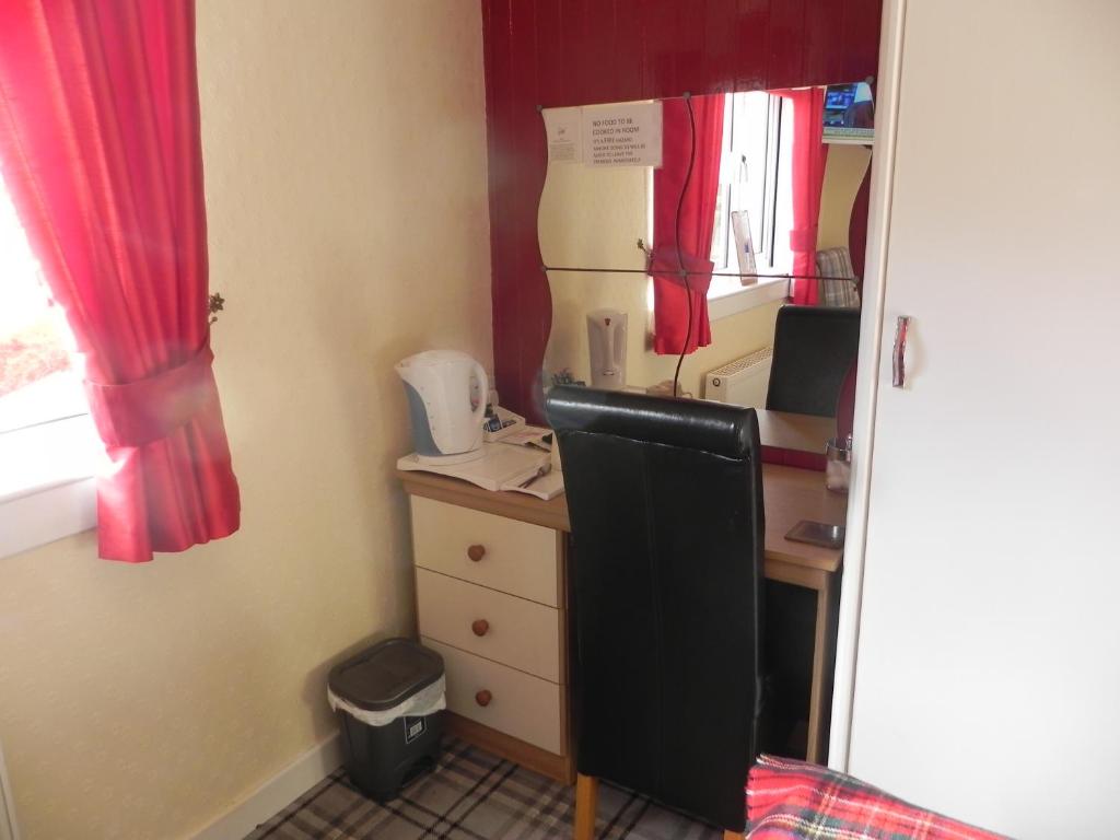 Kuchyň nebo kuchyňský kout v ubytování glenardran house