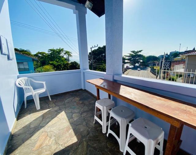 Estudio Ilha Centro Sul Ufsc, ar cond, estac, varanda, vista mar - Housity