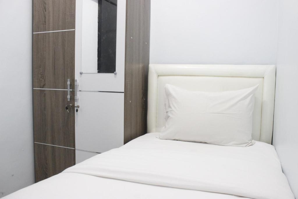 Modest 2BR Apartment at The Jarrdin Cihampelas By Travelio - Apartamento De Dos Dormitorios