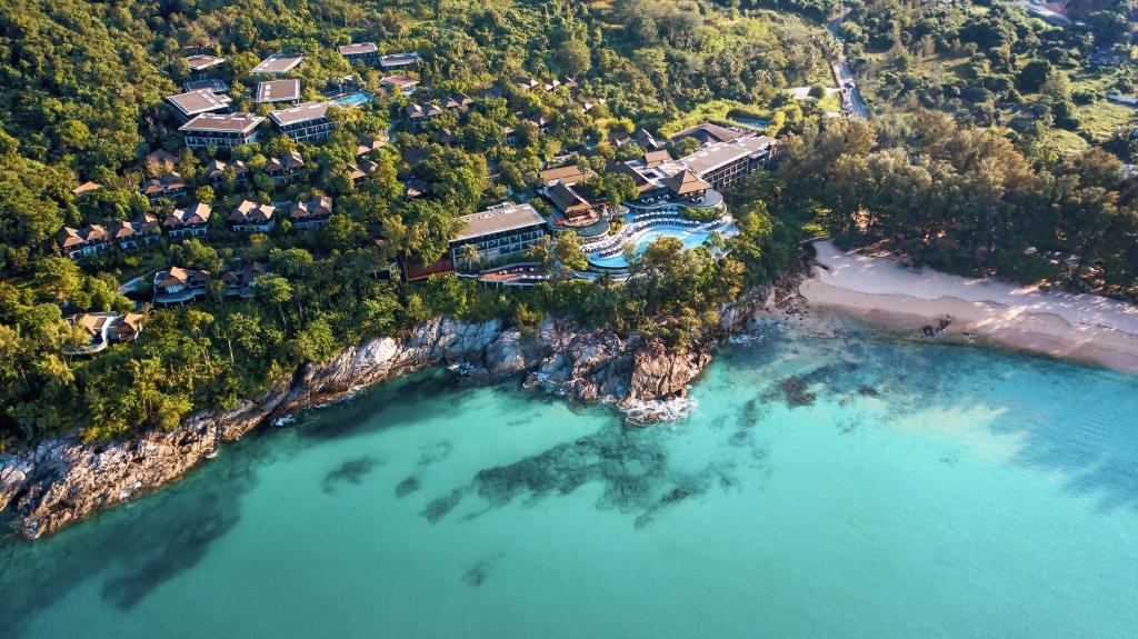 an aerial view of a house on the shore of a beach at Pullman Phuket Arcadia Naithon Beach in Nai Thon Beach