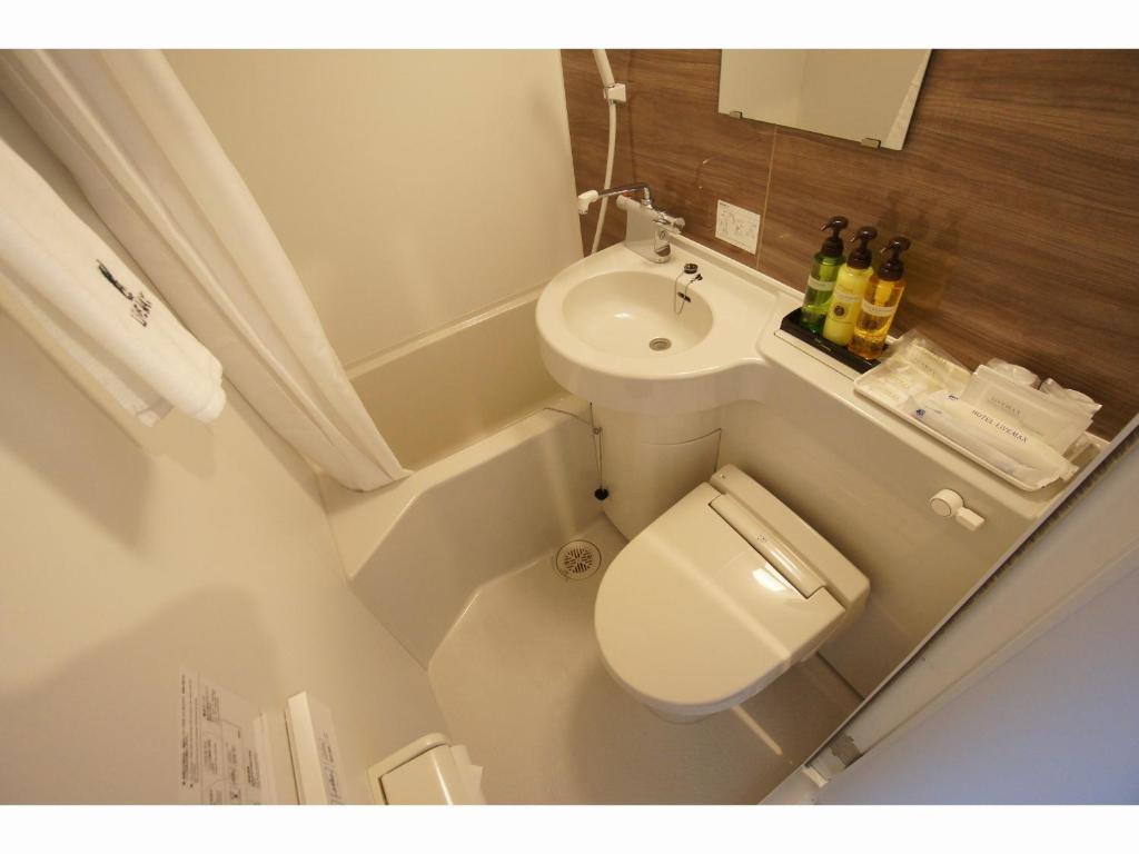 Koupelna v ubytování HOTEL LiVEMAX Minamihashimoto Ekimae