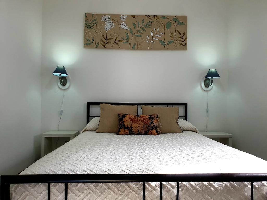 En eller flere senge i et værelse på Casa da Quinta