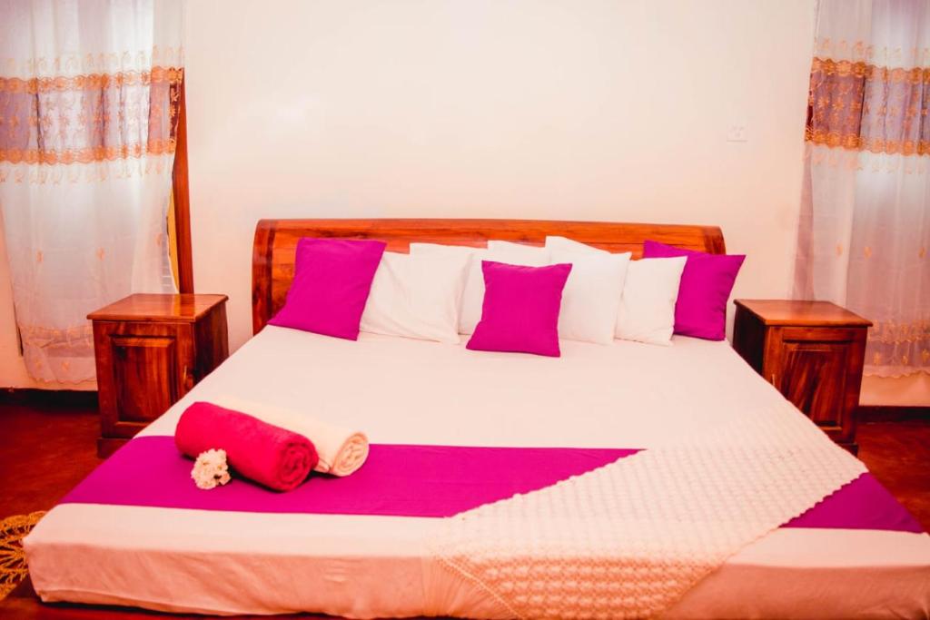 Postel nebo postele na pokoji v ubytování 4ty two Homestay Galle