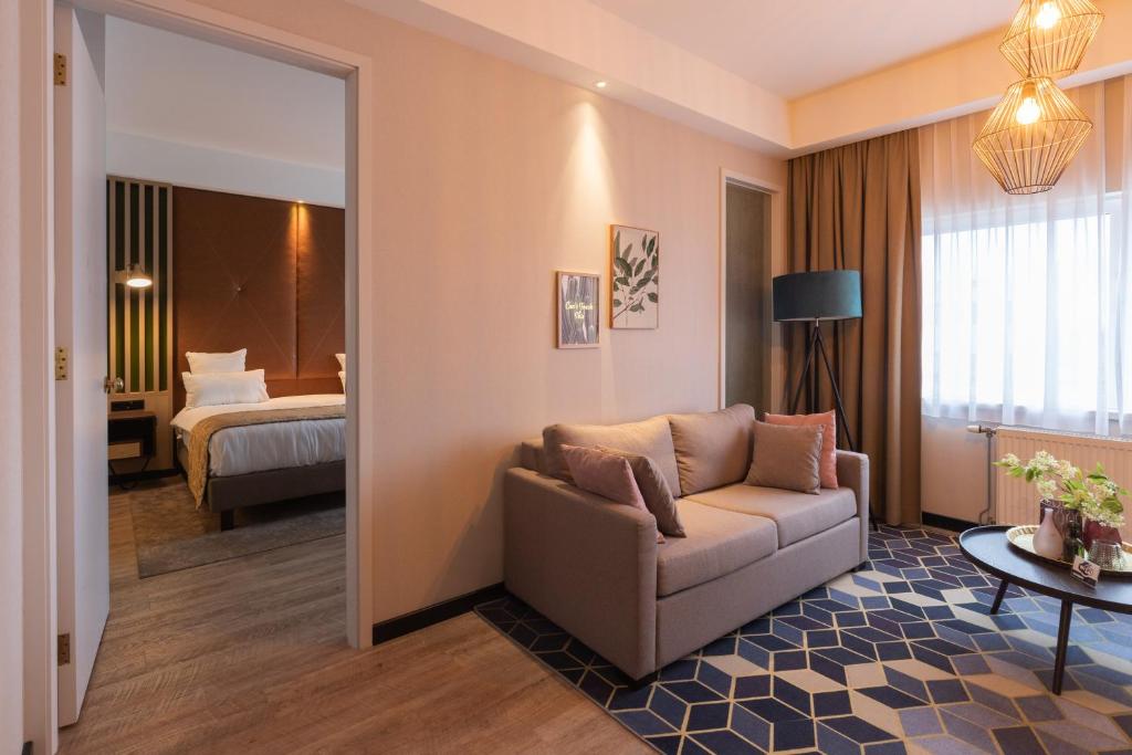 Postel nebo postele na pokoji v ubytování Shanghai Hotel Holland