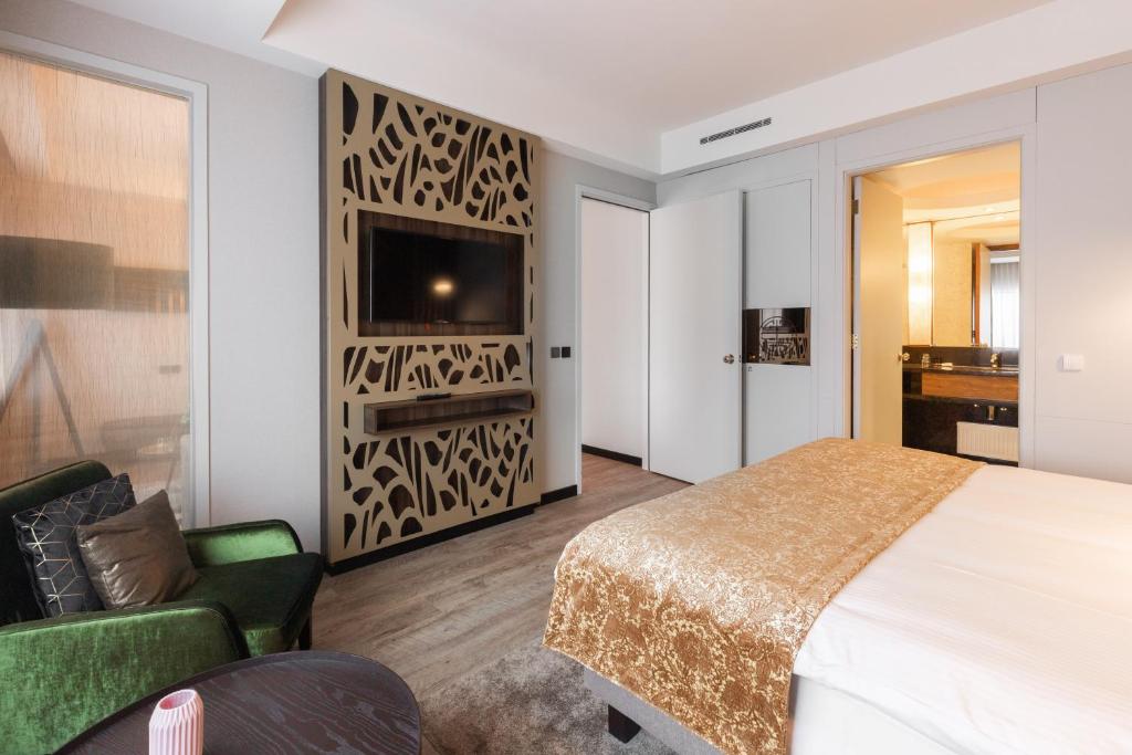 Postel nebo postele na pokoji v ubytování Shanghai Hotel Holland