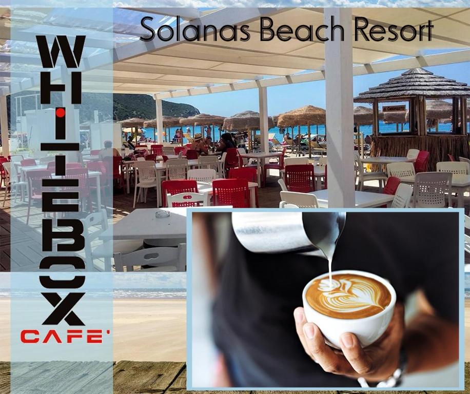 a picture of a person holding a cup of coffee at Sardinia Yellow House in Solanas