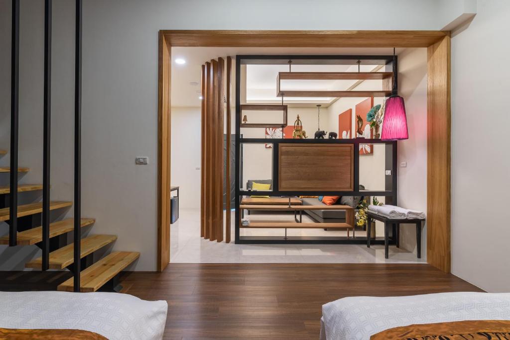 Postel nebo postele na pokoji v ubytování Mambo Boutique Hotel