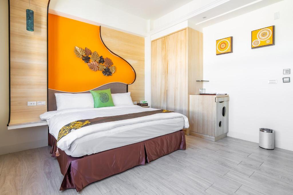 Postel nebo postele na pokoji v ubytování Mambo Boutique Hotel