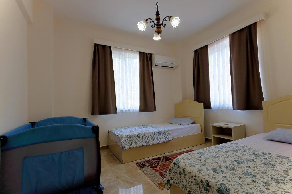 Postel nebo postele na pokoji v ubytování Dalya Life