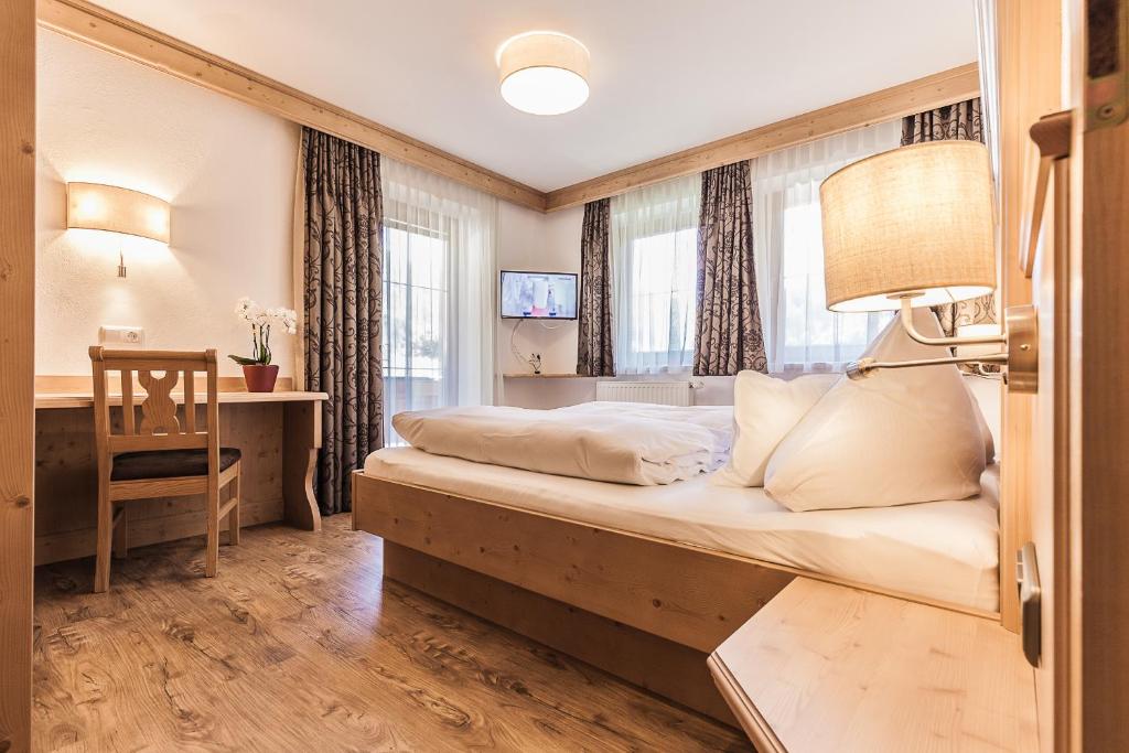 Postel nebo postele na pokoji v ubytování Schönblick Appartements
