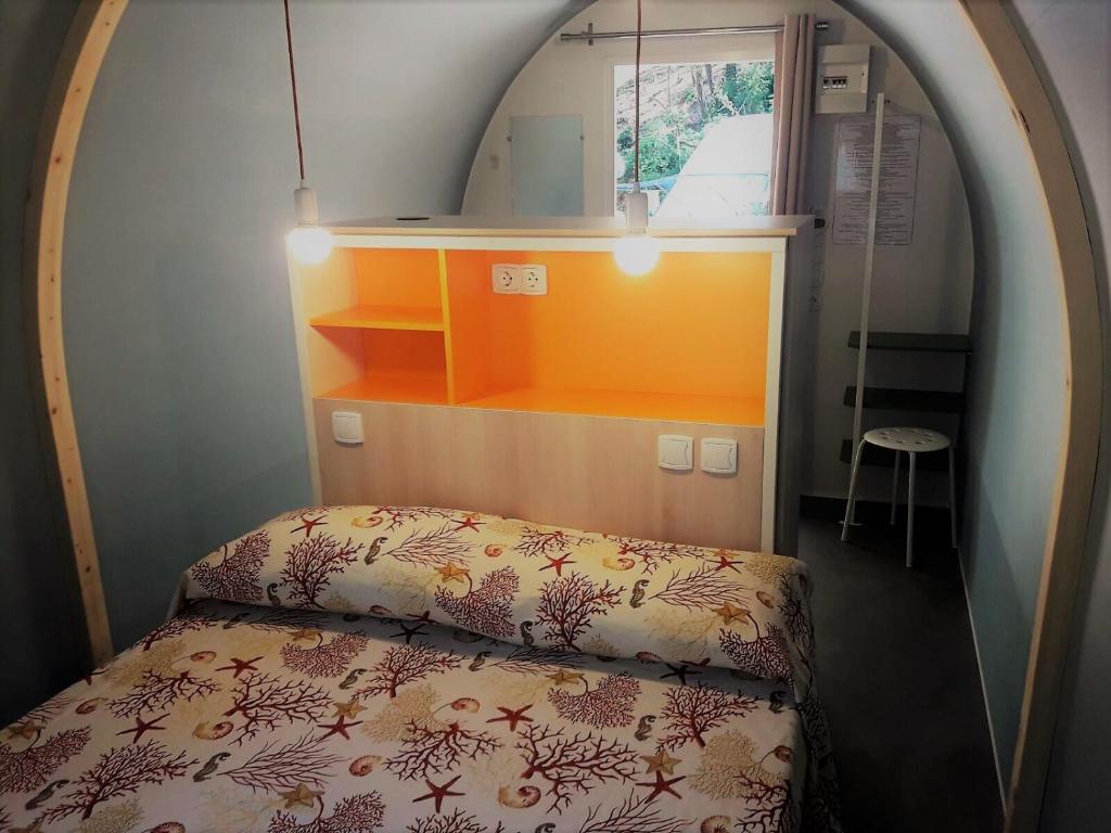 Postel nebo postele na pokoji v ubytování Elbadoc Camping Village