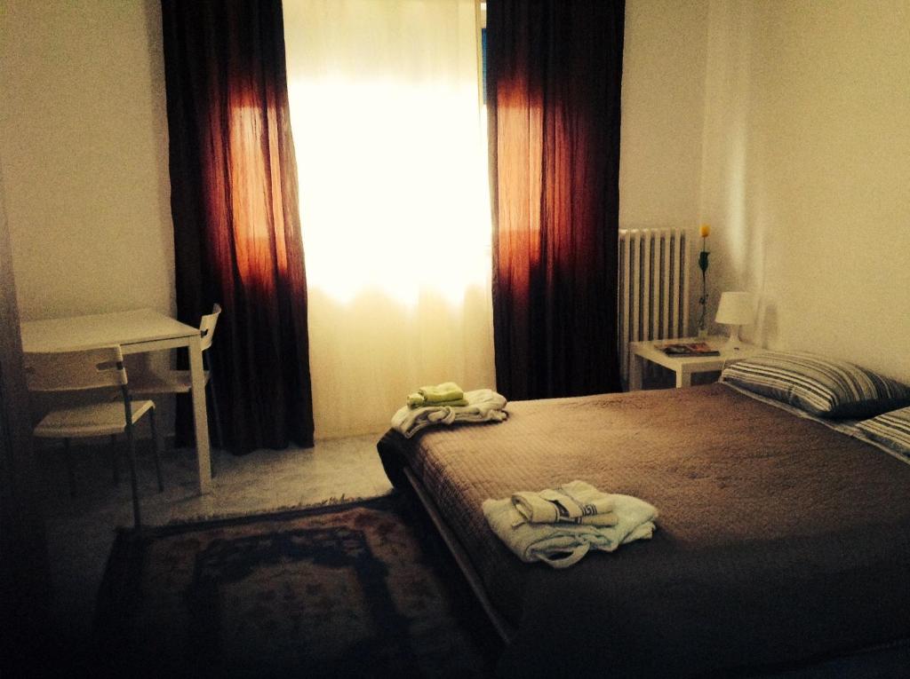 Postel nebo postele na pokoji v ubytování Palazzo Lamanna