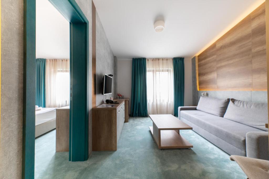 TV a/nebo společenská místnost v ubytování Hotel Nota