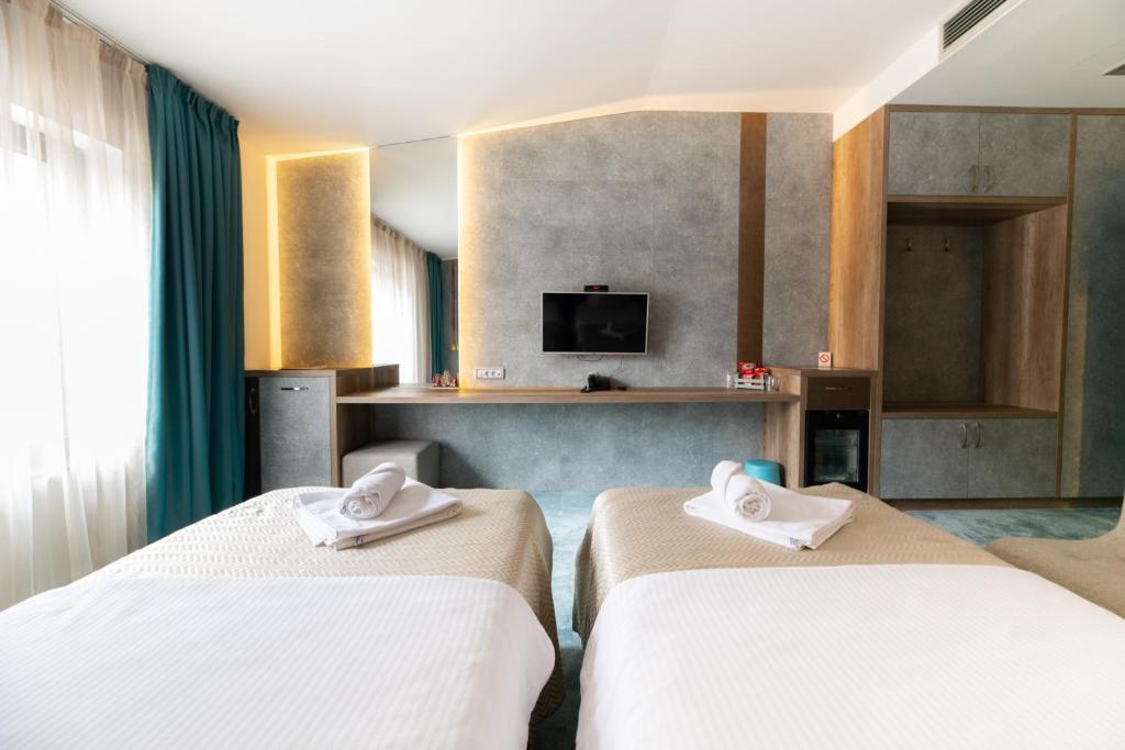 Postel nebo postele na pokoji v ubytování Hotel Nota