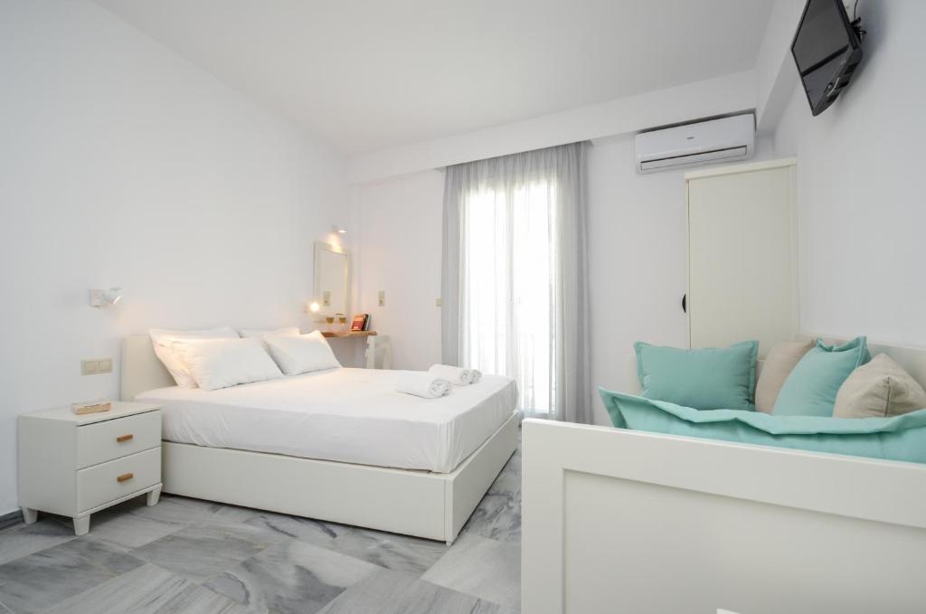 A bed or beds in a room at Soula Naxos
