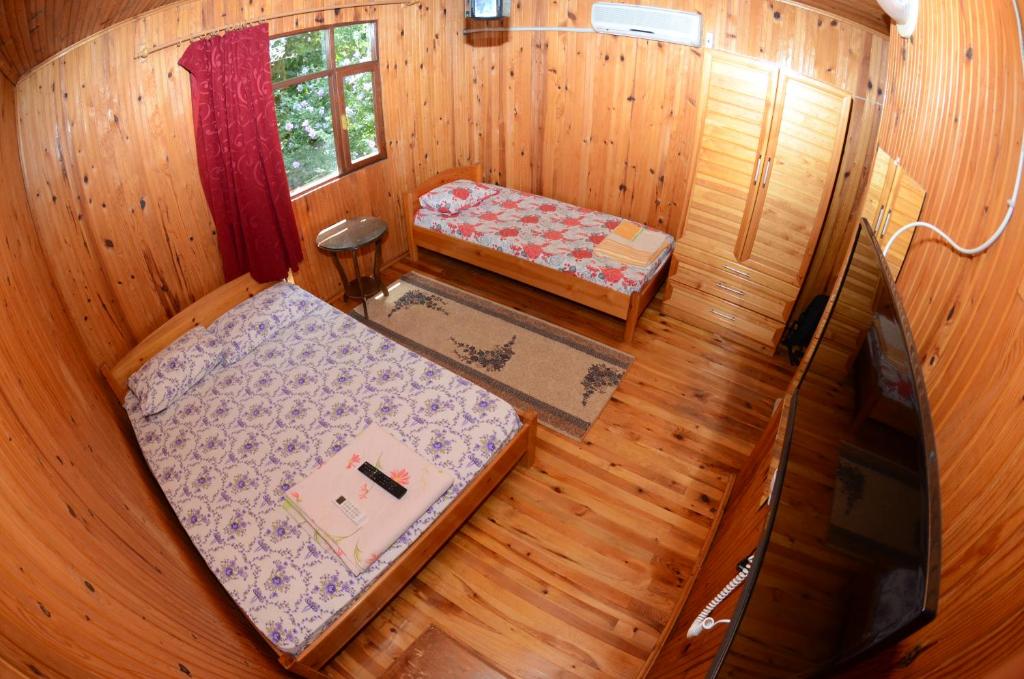 Postel nebo postele na pokoji v ubytování Olympos Camlık Pension