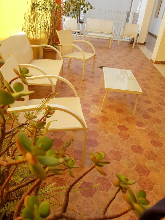 Posezení v ubytování Hotel Plaza Escribano