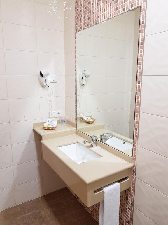 Koupelna v ubytování Hotel Plaza Escribano