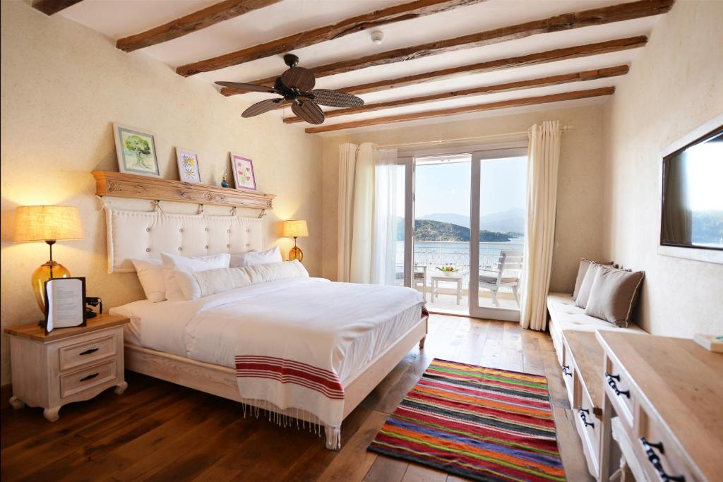 Postel nebo postele na pokoji v ubytování Hotel Unique-Boutique Class - Adults Only