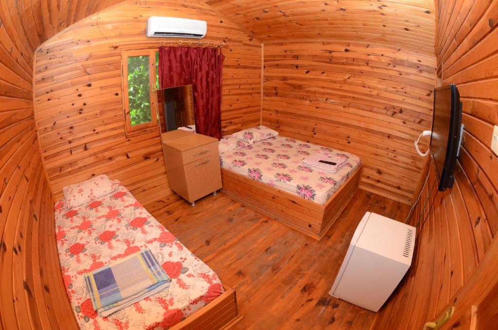 Postel nebo postele na pokoji v ubytování Olympos Camlık Pension