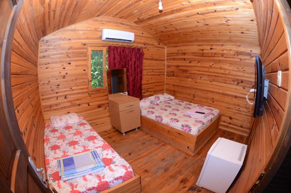 Postel nebo postele na pokoji v ubytování Olympos Camlık Pension