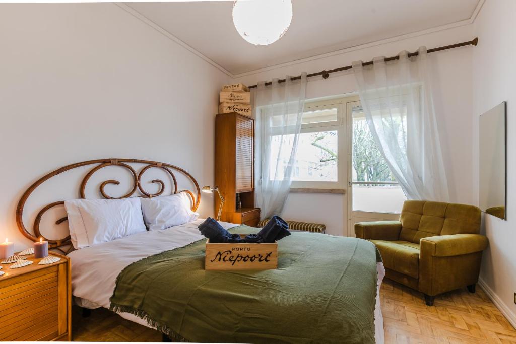 Кровать или кровати в номере Wine Inn Carcavelos Guesthouse