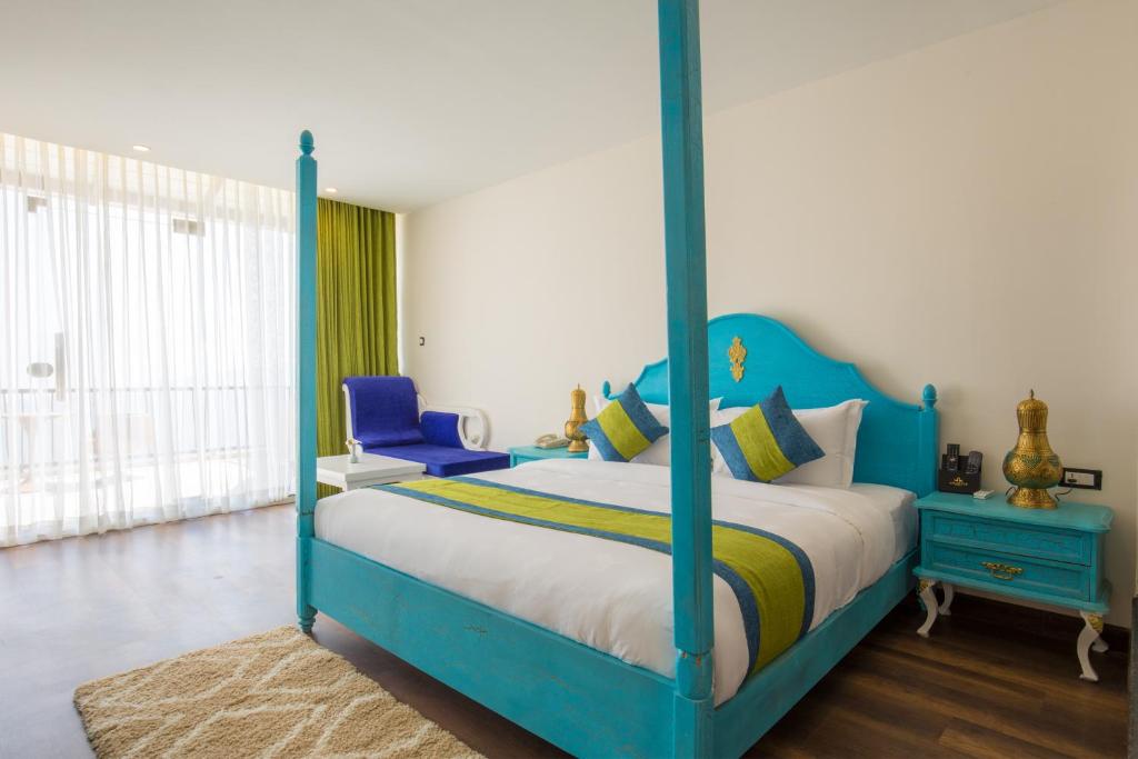 Postel nebo postele na pokoji v ubytování Aagantuk Resort