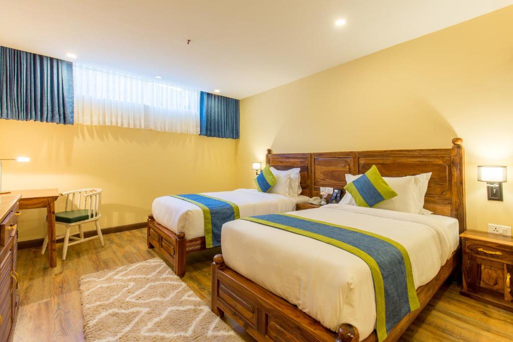 Postel nebo postele na pokoji v ubytování Aagantuk Resort