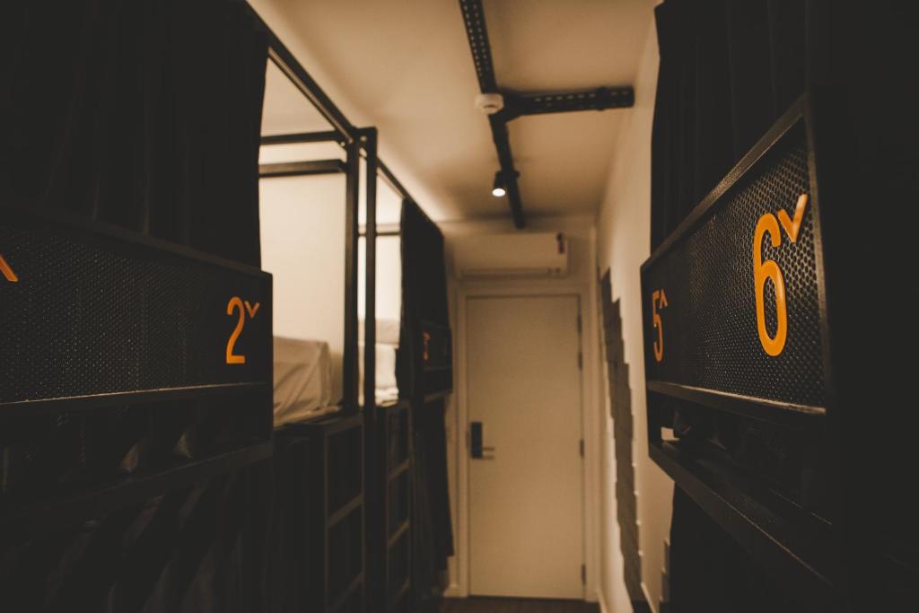 Postel nebo postele na pokoji v ubytování Wanderlust Hostel